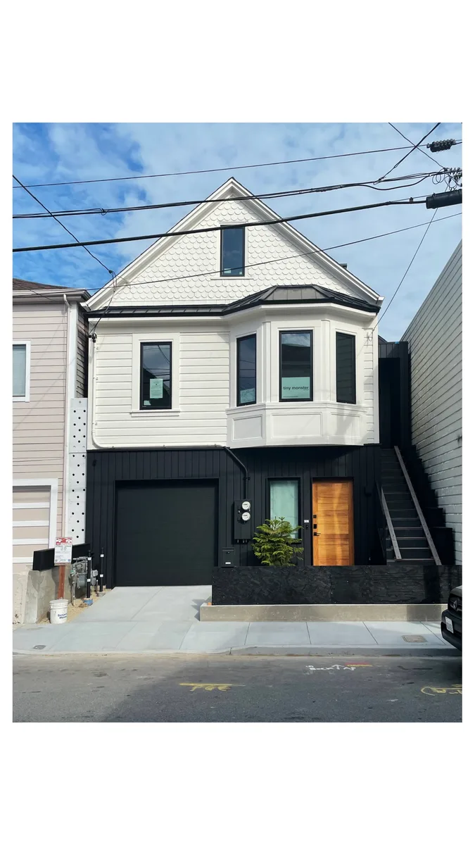 Single-car black garage door on a San Francisco home