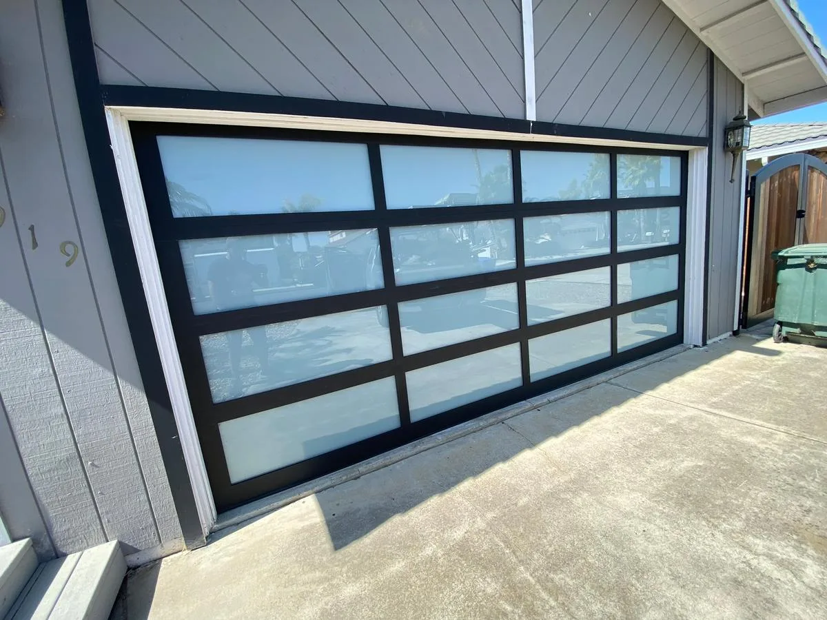 Full-view frosted glass garage door completed installation