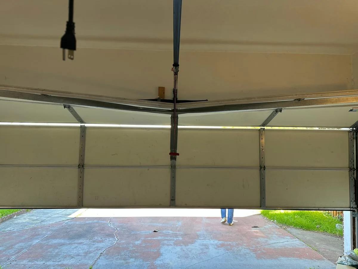 Garage door off track requiring emergency repair service