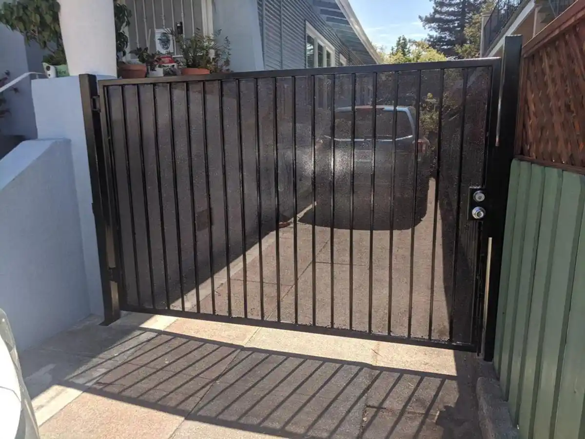 Black iron pedestrian gate installed in Bay Area