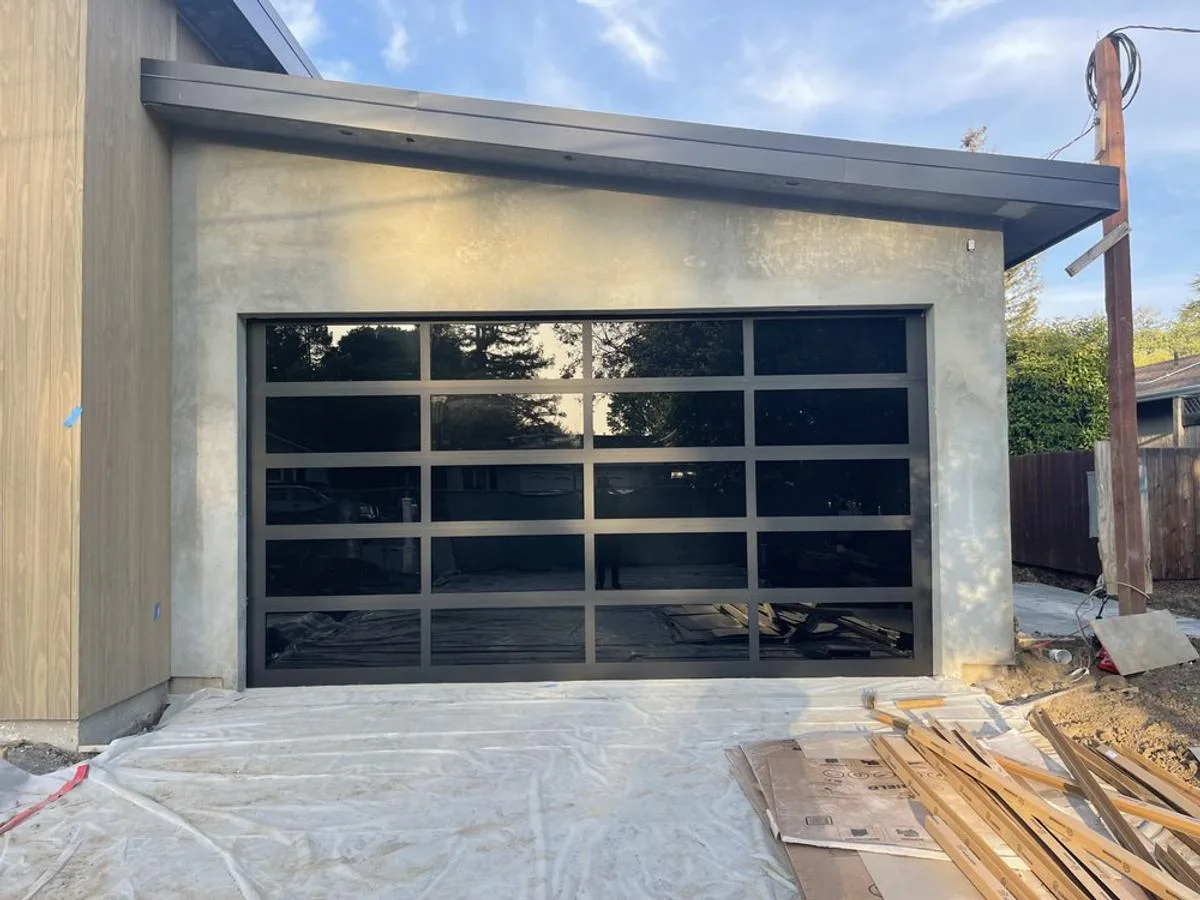 Tinted glass garage door on new construction home