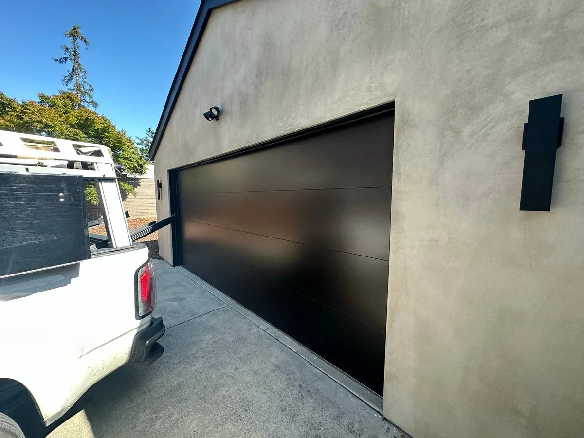 Modern flush garage door on contemporary commercial building