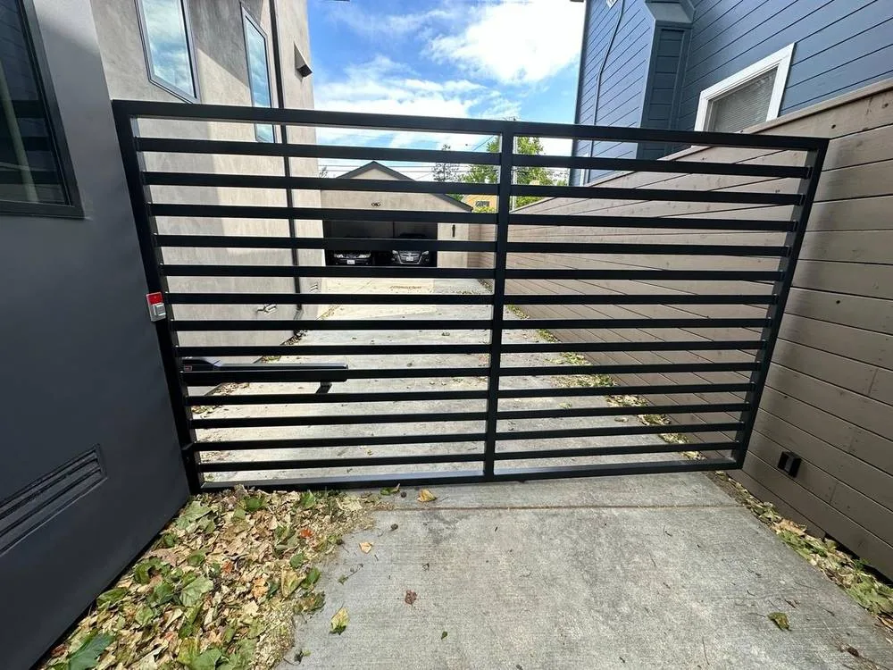 Modern horizontal slat metal driveway gate