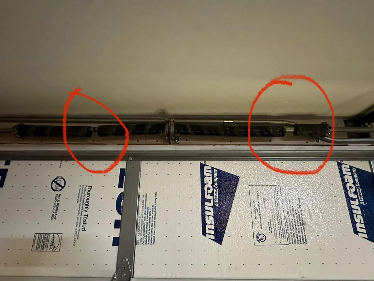 Extension spring replacement on insulated garage door