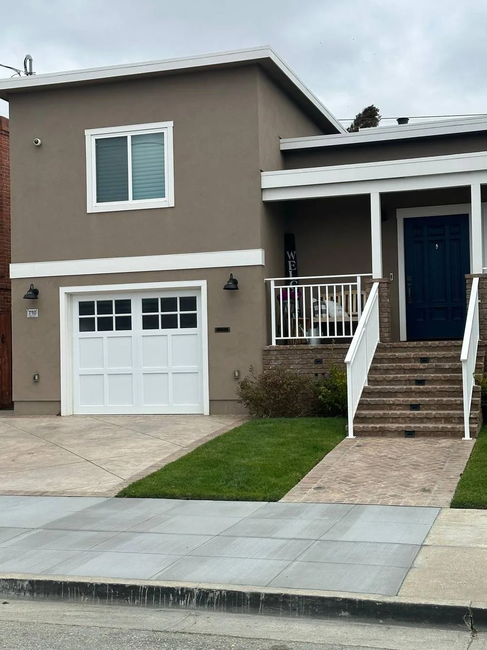 Single car carriage house door on craftsman style home
