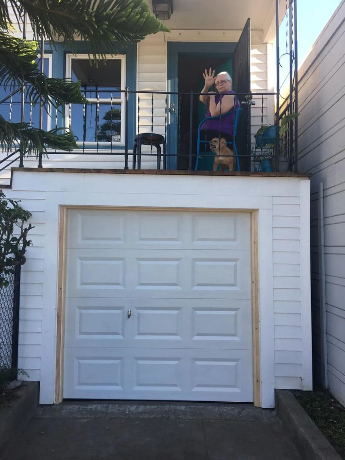 New single car garage door with happy customer