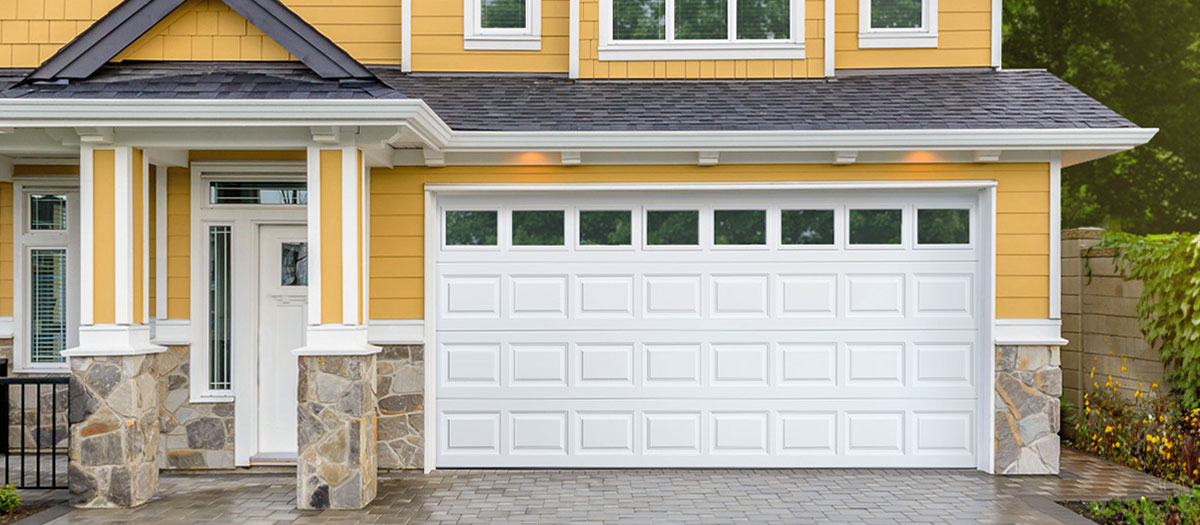 Traditional raised panel garage door installation in Hayward